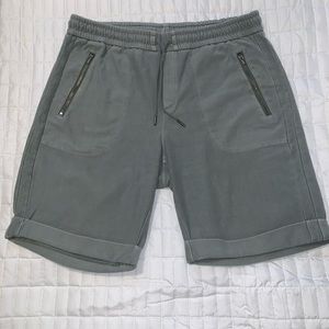 Athleta olive green Bermudan style length Womens shortsw/drawstring Sz-10